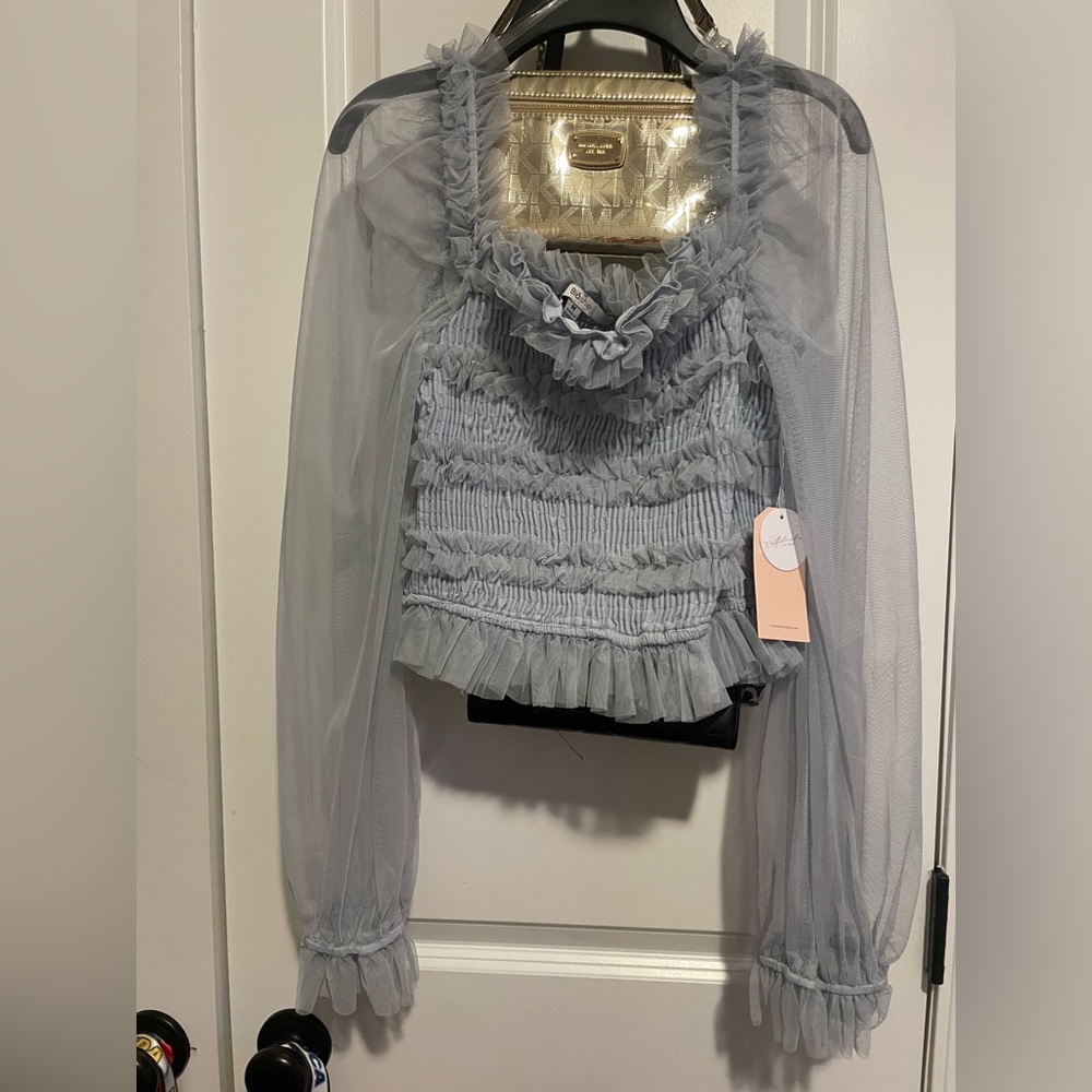 blue ruffle top never worn
